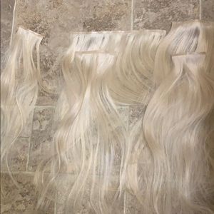Clip in hair extensions.